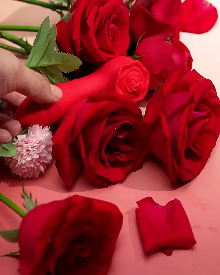 Rosé Sonic Bloom nestled among flowers to show discreet beauty and compact size
