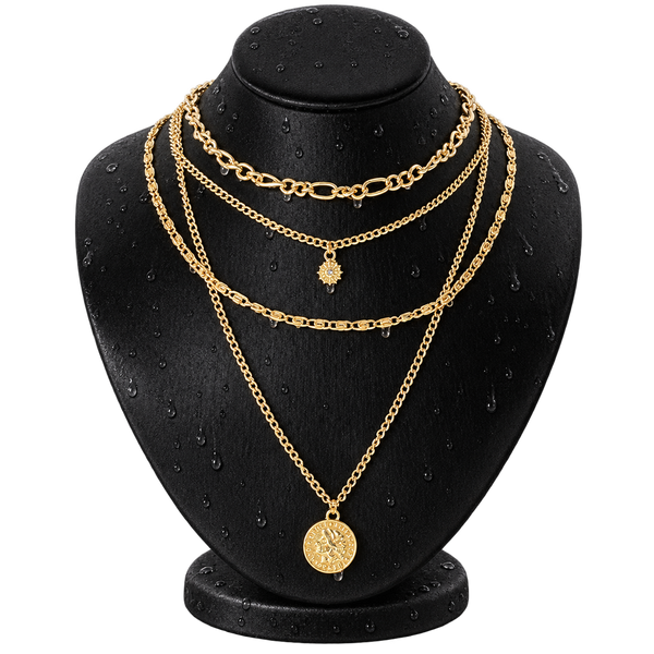 Complimentary Tu Mando Charm Necklace on its black display bust